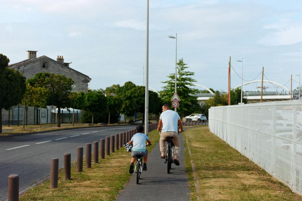 father and son riding bike